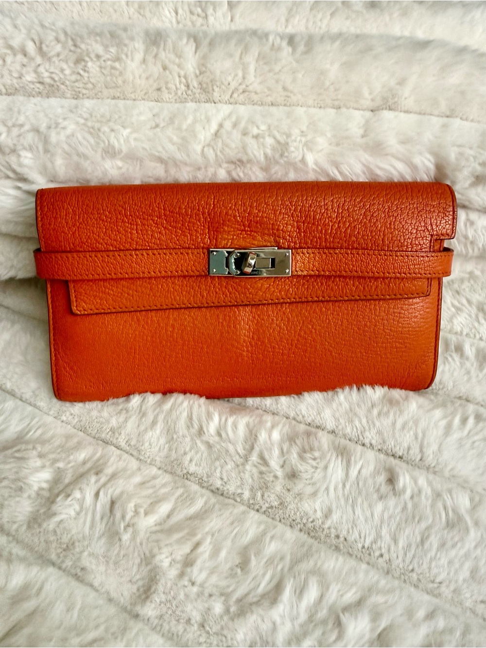 Hermes Kelly Orange-Red Togo Leather wallet with Silver Hardware